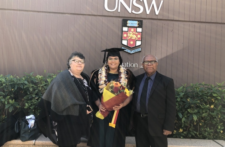 Bridget Cama Graduation with family members