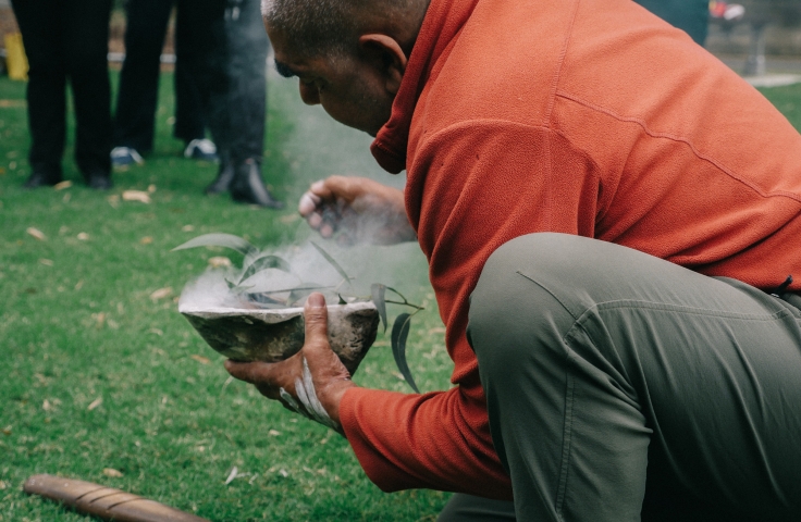 Uncle Dean Kelly at smoking ceremony for Alumni Park